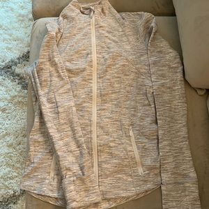 EUC lululemon on the move zip up jacket with cuffins